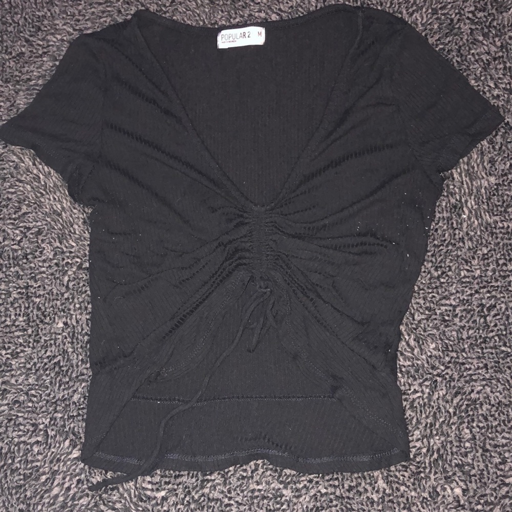 Black tie in the front crop top.